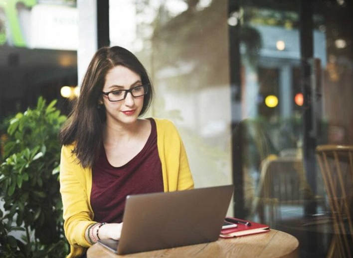 Student job applicant reviewing temporary employment contract on desktop ​